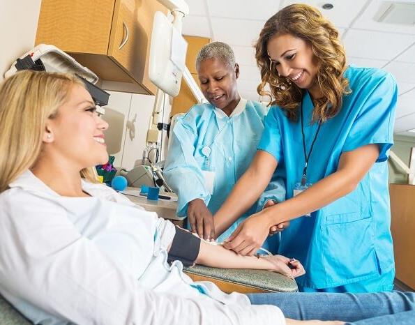 Nurse educator supervising during nursing student clinicals